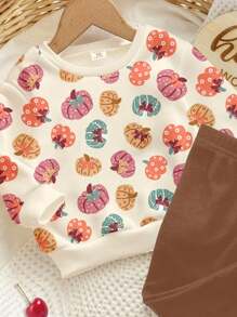 SHEIN Happikins 杏仁色可爱花卉蝴蝶结小南瓜图案秋日女婴休闲柔软加厚圆领长袖卫衣和打底裤套装，适合秋冬季节，舒适透气，适合女婴秋季叠穿，时尚百搭，休闲装扮，女婴图案服装，秋季服装，适合外出、野餐、居家、农场、万圣节等场合。