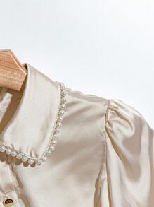 GlowEve Áo cánh nữ tay dài màu trơn cài khuy đơn đính ngọc trai giả thanh lịch - Rượu sâm banh - Xem 4