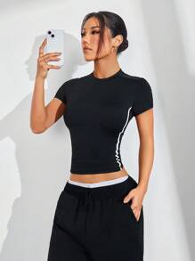 SHEIN Sport Studio Top da allenamento corto con schiena a incrocio FeatherFit™