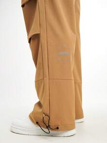 Pantalones casuales sueltos de pierna ancha con cintura elástica y pliegues para hombres, color marrón - Marrón - Ver 3