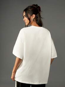 Missguided x Playboy Camiseta Oversized com Estampa Gráfica de Motorsport, Logotipo de Corrida com Estrelas, Moda Streetwear de Festival, Camiseta Declarativa de Estética Retrô, Casual Top de Corrida de Carros