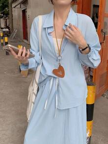 DAZY Conjunto de 2 piezas de camisa y falda de unicolor versátil y casual para mujer