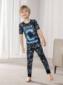 GODZILLAxKONG X SHEIN 2pcs Young Boy Snug Fit Cartoon Graphic Crew Neck Short Sleeve Top And Pants Knit Comfortable Casual Sleepwear Pajama Set - Black - View 1