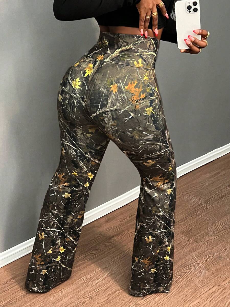 SHEIN CURVE+ Leggings de mujer de talla grande, de ajuste ceñido y largo, con diseño cruzado de cintura alta y estampado minimalista en inglés, adecuados para fiestas y para las temporadas de primavera y otoño - Multicolor - Ver 1