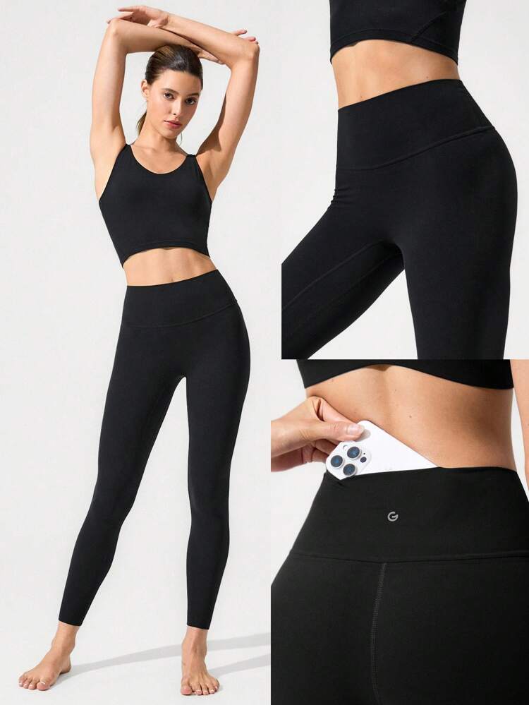 26-calowe legginsy FeatherFit™ Keep It Classic z wysokim stanem bez szwów i kieszeniami z tyłu, zapewniające wygodę i niski wpływ na codzienne noszenie w studiu jogi