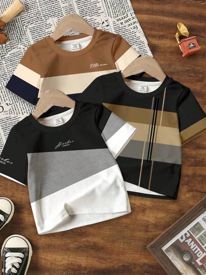 SHEIN 年轻男孩休闲经典色块拼布图案，酷炫图形文字印花舒适短袖 T 恤，适合春夏季