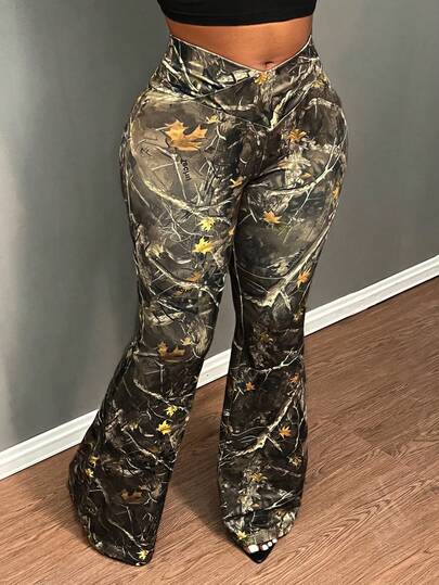 SHEIN CURVE+ Quần legging nữ dáng dài, ôm sát, tối giản, in họa tiết Anh, cạp cao, thiết kế chéo, ống loe nhẹ, thích hợp cho các bữa tiệc, mùa xuân và mùa thu.