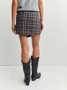 Nöista 黑色格子迷你裙，经典短款剪裁，俏皮流苏装饰，秋季理想之选 - 黑色 - 查看 2