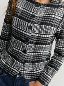 Nöista Chaqueta a cuadros en blanco y negro con mangas largas y botones grandes, ideal para el otoño o estilos de negocios casuales atemporales en invierno.