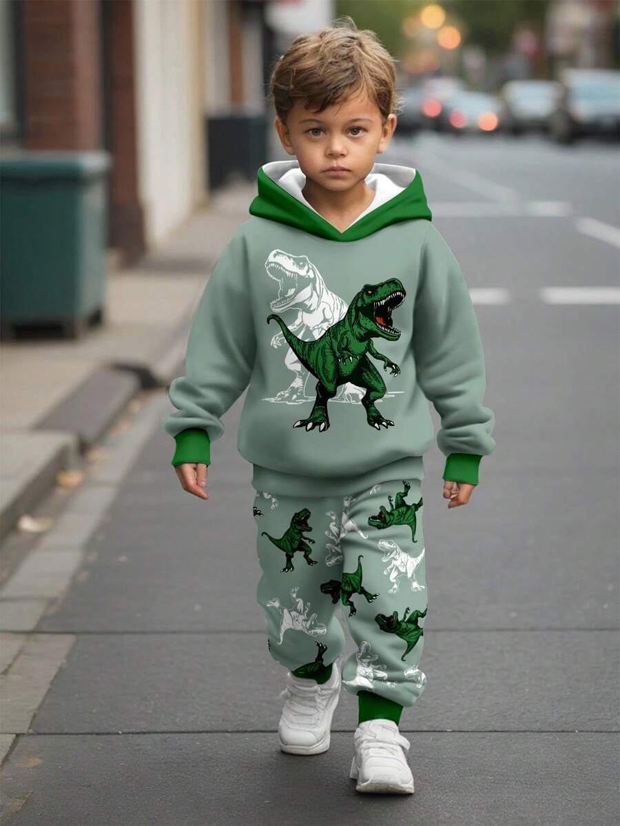SHEIN 2 piezas Conjunto de sudadera con capucha de manga larga con estampado de dinosaurio, de corte holgado y estilo deportivo casual y cómodo, adecuado para otoño e invierno, ropa de dinosaurio para niños pequeños, conjunto de ropa verde para niños pequeños