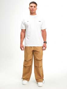 Pantalones casuales sueltos de pierna ancha con cintura elástica y pliegues para hombres, color marrón - Marrón - Ver 6