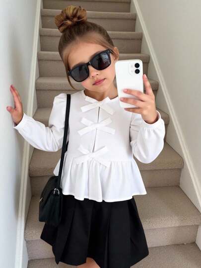年轻女孩休闲百搭编织纯色前蝴蝶结装饰荷叶边下摆泡泡袖长袖修身白衬衫，返校，返校，夏季上衣，年轻女孩服装，娃娃装上衣，白色上衣，白衬衫，长袖上衣，可爱上衣，返校季节，妈妈和女儿和姐妹搭配。