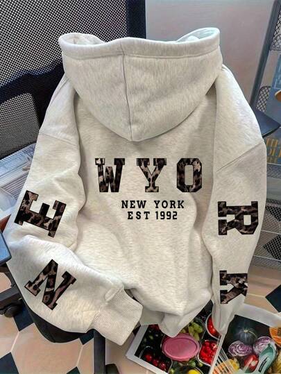 Flirla Sudadera holgada con estampado de leopardo y gráfico de letra para mujer de talla grande, para otoño e invierno