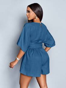 SOLERSUN Combinaison élégante pour femmes avec col en V profond, taille cintrée, nœud devant, manches chauve-souris et taille froncée. Convient pour les vacances et les tenues quotidiennes