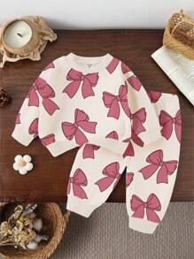 SHEIN Bộ đồ 2 món cho bé gái, gồm áo nỉ dài tay cổ tròn in nơ và quần nỉ, màu hồng, thích hợp cho mùa thu/đông. - Nhiều màu - Xem 3