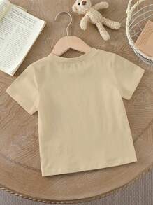 SHEIN Playful Pals Toddler Boys' Smiling Face Print Crew Neck Short Sleeve Basic T-Shirt, Summer