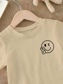 SHEIN Playful Pals Toddler Boys' Smiling Face Print Crew Neck Short Sleeve Basic T-Shirt, Summer