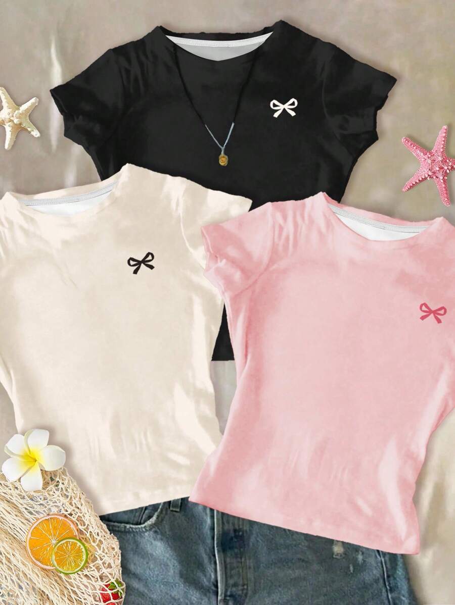 SHEIN Bộ 3 áo thun dài tay cổ tròn, tay lỡ, màu kem trắng, hồng kem, tối màu, trang trí nơ tối giản, thoải mái, mùa hè, dễ chịu, nhiều lớp quần áo mùa thu cho trẻ em, trẻ em sành điệu, trang phục thường ngày, quần áo họa tiết trẻ em, trở lại trường, quần áo mùa thu, tiệc chào đón - Nhiều màu - Xem 1