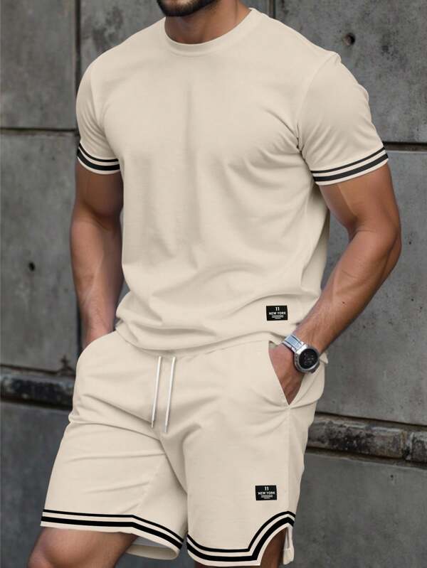Manfinity Homme Conjunto casual de dos piezas para hombre con camiseta de manga corta de cuello redondo con estampado de rayas y shorts con cordón en la cintura