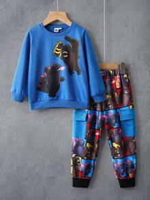 GODZILLAxKONG X SHEIN Conjunto de sudadera de cuello redondo de punto con estampado gráfico de estilo y de King Kong para niño, y pantalones de chándal con bolsillo con solapa de estampado a cuadros de retazos de colores, para otoño/invierno