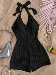 SHEIN Teen Girls Vacation Black Knitted Crinkled Fabric Halter Neck Bow Jumpsuit, Snug Fit & Suitable For Party, Valentine's Day, Wear As Innerwear Or Outerwear Black Halter Dress Black Romper Black Playsuit Textured Mini Playsuit - Black - View 1