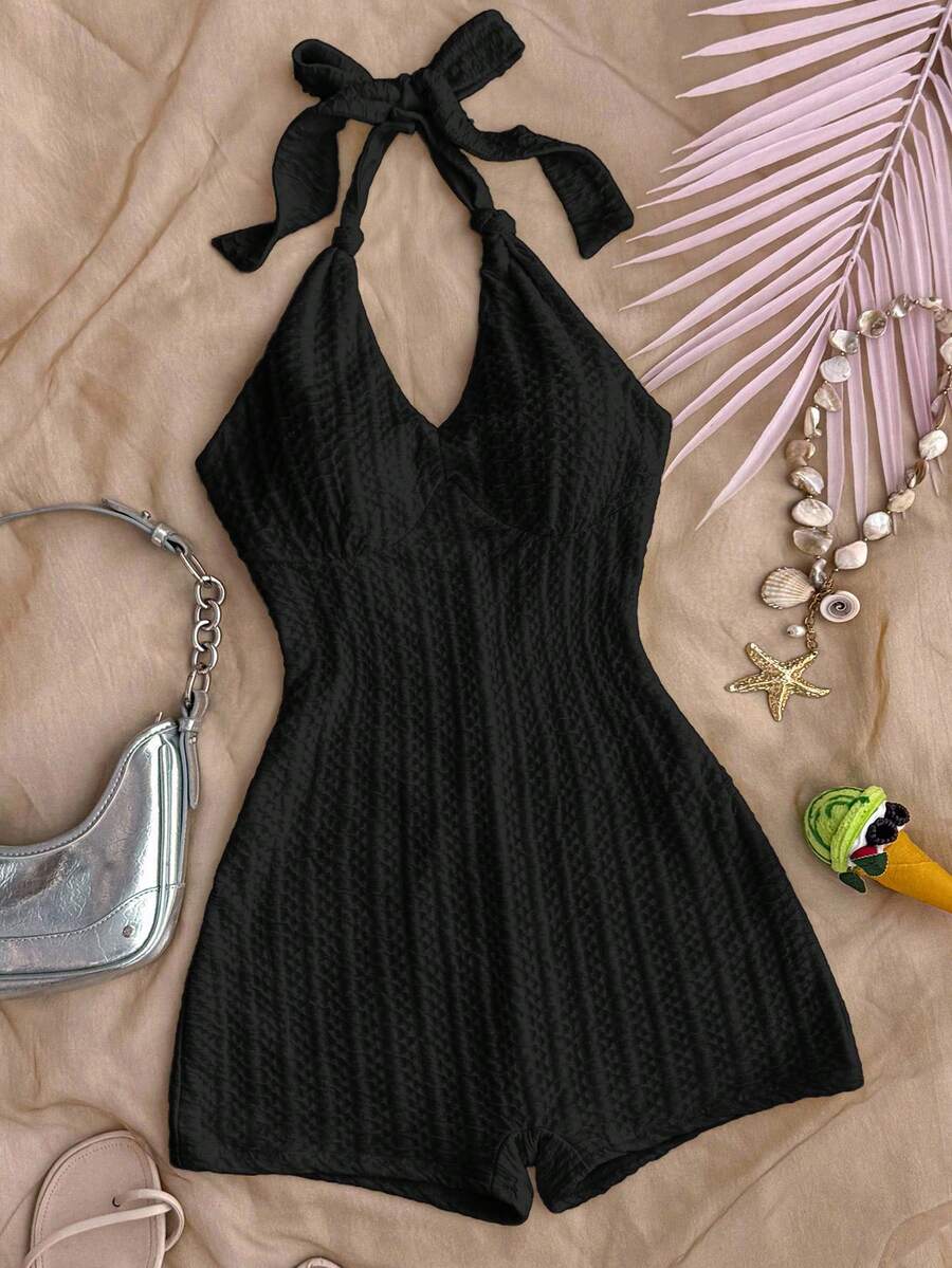 SHEIN Teen Girls Vacation Black Knitted Crinkled Fabric Halter Neck Bow Jumpsuit, Snug Fit & Suitable For Party, Valentine's Day, Wear As Innerwear Or Outerwear Black Halter Dress Black Romper Black Playsuit Textured Mini Playsuit - Black - View 1