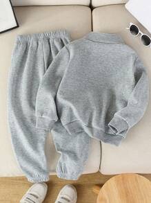 SHEIN Streecool Kids 2pcs Young Boy Casual Minimalist Half-Zip Stand Collar Sweatshirt & Elongated Sweatpants Set, Daily Outfit Boys Sweat Set Kids Sweat Set Boys Jogger Sets Kids Jogger Sets Boys Two Piece Set Boys Lounge Set Boys Casual Set 2 Pcs Set Young Boy Boys Autumn Winter Casual Two Piece Set Fall