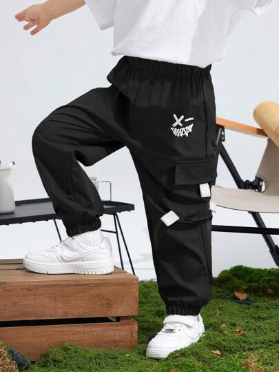 SHEIN Tween Boys Casual Graphic Print Loose Fit Cargo Pants With Pockets, Suitable For Commuting, School, Daily Casual, Travel, Sports In Spring, Summer, Autumn, Winter Black Cargo Pants
