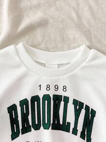 SHEIN Playful Pals 2pcs/Set Infant Baby Boy White Knit Sweatshirt With Green Color Block & Letter Print Long Sleeve Top & Military Green Elastic Waist Pocket Woven Pants, Fits 6 Months To 2-3 Years Old Baby Boy Brooklyn Outfit Baby Boy Casual Outfit Baby Boy Outfit Set Baby Boy Clothes Baby Boy Cargo Pants Set Baby Boys Outfit Baby Boy Sweatsuit, Outfit, Infant Qutfits, Tracksuits, Infant Boy Winter Clothes Set, Baby Boy Cargo Pants Baby Boy Sweatshirt Outfit Boys Green Pants Fall - Multicolor - View 5