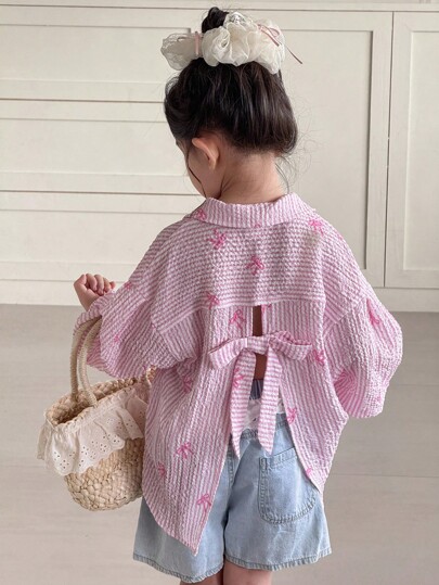 SHEIN Little Byeori Young Girl Woven Bow Striped Shirt With Criss-Cross Back Design, Casual, Korean Style, Suitable For Spring, Summer, Autumn, Winter Girls Open Back Shirt Girls Pink Bow Shirt Girls Tie Back Shirt Girls Fall Outfits Long Sleeve Pink Striped Blouse With Drop Shoulder And Stylish Back Bow Accent  Girls Pink Shirt