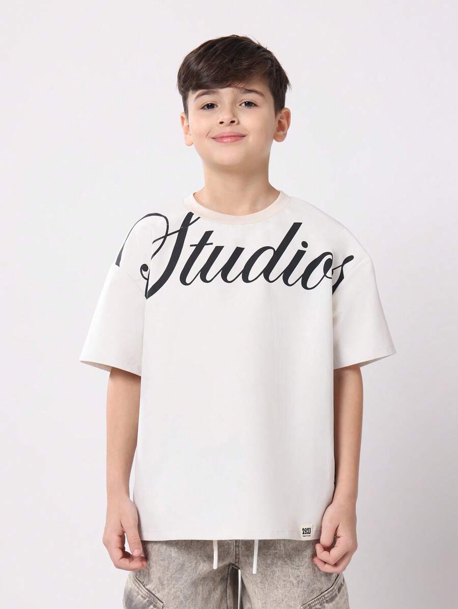 SUMWON Áo thun in chữ Oversized Studios dáng rộng trễ vai thời trang tuổi teen xuân hè thu thường ngày cuối tuần phong cách đường phố đô thị - Màu Khaki - Xem 1