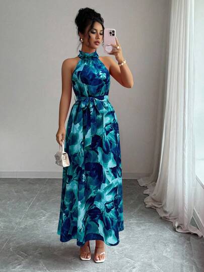 Elenzga Elegant klänning med blommönster för pendling och ö-semester