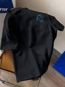 Camiseta casual de verano para hombre de manga corta y cuello redondo con impresión de letras y cara sonriente