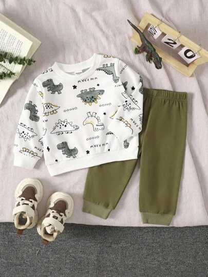 SHEIN 2pcs Baby Boy Dinosaur Print Round Neck Long Sleeve Top And Solid Green Pants Set, Suitable For Outdoor Play, Casual And Sports Wear, Spring/Autumn Baby Boy Clothes Baby Boy Clothes Dinosaur Baby Boy Clothes Baby Boy Dinosaur Outfit Baby Boy Sweatsuit, Outfit, Infant Qutfits, Tracksuits, Cozy Pixies, Infant Boy Winter Clothes Set, Boy Clothes For Toddler, Baby Boys Sets, Boy Fall Outfits, Baby Set Autumn Winter Season, 6M-3T Baby Boy Dinosaur Set