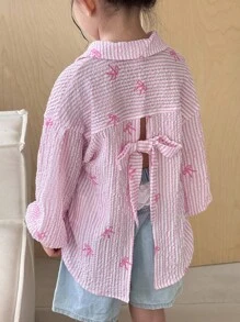 SHEIN Young Girl Woven Bow Striped Shirt With Criss-Cross Back Design, Casual, Korean Style, Suitable For Spring, Summer, Autumn, Winter Girls Open Back Shirt Girls Pink Bow Shirt Girls Tie Back Shirt Girls Fall Outfits Long Sleeve Pink Striped Blouse With Drop Shoulder And Stylish Back Bow Accent  Girls Pink Shirt - Pink - View 7