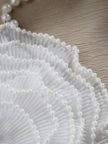 SHEIN 心形花卉图案珍珠装饰上衣，适合派对、俱乐部、音乐节晚宴和其他活动。