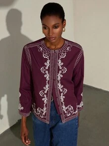 Aveloria Modichic Chemise à manches longues col rond minimaliste à simple boutonnage, avec poignets évasés à broderie florale contrastée