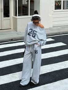 SHEIN EZwear Conjunto de 2 piezas con top de manga larga con estampado de letras y números en cuello asimétrico y pantalones largos con cordón en la cintura para mujer