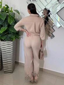 Andrea Bello 2 件套：优雅蕾丝拼布镂空上衣和喇叭裤（女款）