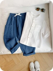 SHEIN 2pcs/Set Boys Casual Sports Vacation Clean Design White Collar Short Sleeve Shirt & Elastic Waist Pocket Solid Color Pants Set, Suitable For Kids Outfits, Young Boy Clothes, Back To School, Birthday Parties, Evenings, Performances, Weddings, Valentine's Day, Everyday Use, School, Travel, Sports, Spring And Summer - Multicolor - View 1