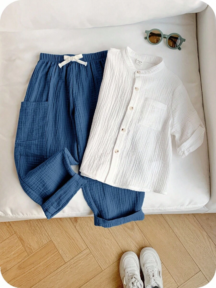 SHEIN 2pcs/Set Boys Casual Sports Vacation Clean Design White Collar Short Sleeve Shirt & Elastic Waist Pocket Solid Color Pants Set, Suitable For Kids Outfits, Young Boy Clothes, Back To School, Birthday Parties, Evenings, Performances, Weddings, Valentine's Day, Everyday Use, School, Travel, Sports, Spring And Summer - Multicolor - View 1