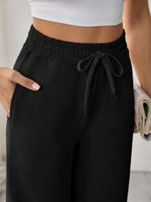 EURMUSE Women's Straight Leg Sport Pants With Pocket And Stitching Detail - Black - View 6