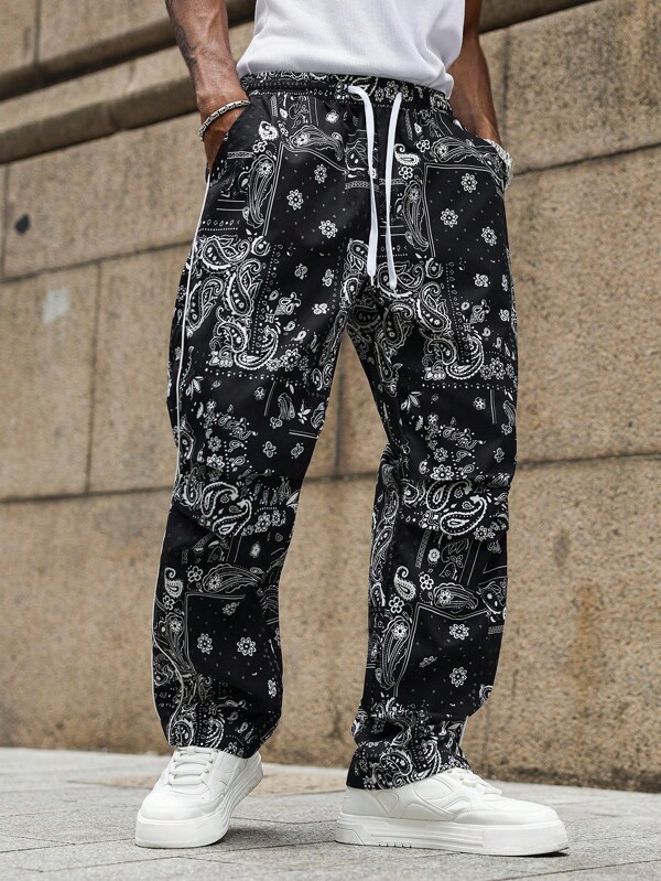 PAVTROS Manfinity Streetrush Men's Street Academy Style Loose-Fit Straight-Leg Pants Feature All-Over Digital Printing Of Paisley Patterns, Perfect For Matching With INS, High-Street And Hip-Hop Looks. Ideal For Street Rock Styles, Music Festivals And Daily