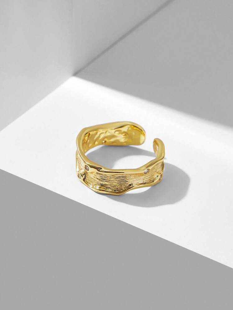 ANILLO ABIERTO ASIMÉTRICO ENCHAPADO EN ORO DE 18K