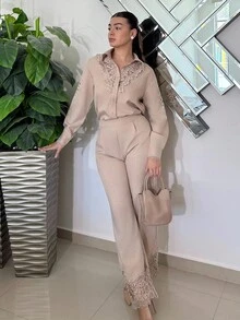 Andrea Bello 2 件套：优雅蕾丝拼布镂空上衣和喇叭裤（女款）