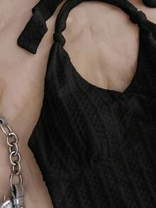 SHEIN Teen Girls Vacation Black Knitted Crinkled Fabric Halter Neck Bow Jumpsuit, Snug Fit & Suitable For Party, Valentine's Day, Wear As Innerwear Or Outerwear Black Halter Dress Black Romper Black Playsuit Textured Mini Playsuit - Black - View 4