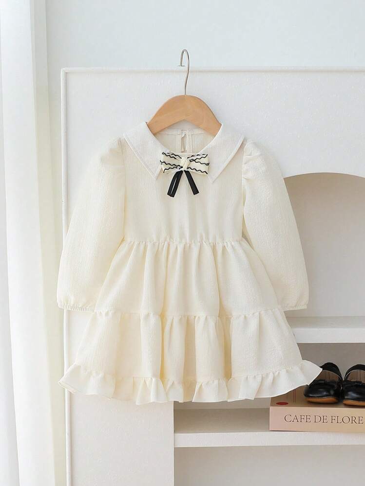 Souflis Souflis 3M-3Y 女婴优雅法式简约连衣裙，彼得潘领，撞色黑色蝴蝶结装饰，分层裙摆设计，舒适宽松版型，适合生日派对、学校、摄影，秋冬新品 - 杏色 - 查看 4