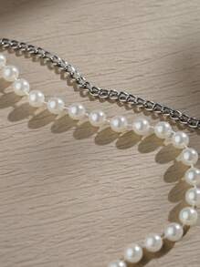 SHEIN 心形花卉图案珍珠装饰上衣，适合派对、俱乐部、音乐节晚宴和其他活动。