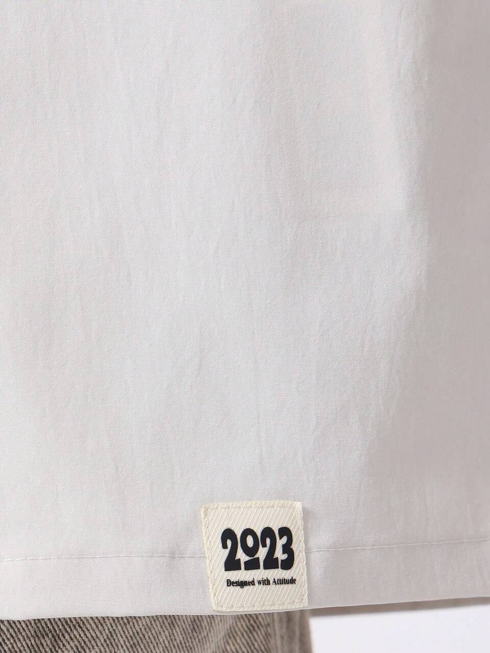 Camiseta extragrande con estampado de texto de Studios y hombros caídos