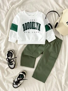 SHEIN Playful Pals 2pcs/Set Infant Baby Boy White Knit Sweatshirt With Green Color Block & Letter Print Long Sleeve Top & Military Green Elastic Waist Pocket Woven Pants, Fits 6 Months To 2-3 Years Old Baby Boy Brooklyn Outfit Baby Boy Casual Outfit Baby Boy Outfit Set Baby Boy Clothes Baby Boy Cargo Pants Set Baby Boys Outfit Baby Boy Sweatsuit, Outfit, Infant Qutfits, Tracksuits, Infant Boy Winter Clothes Set, Baby Boy Cargo Pants Baby Boy Sweatshirt Outfit Boys Green Pants Fall - Multicolor - View 3